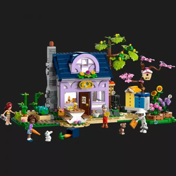 Конструктор LEGO Friends Будиночок і квітник бджолярів (42669)